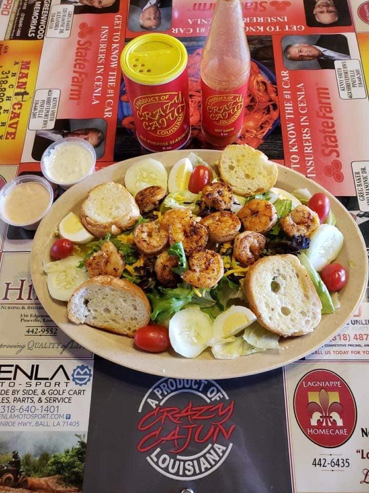 A relaxed dining room with seafood plates.