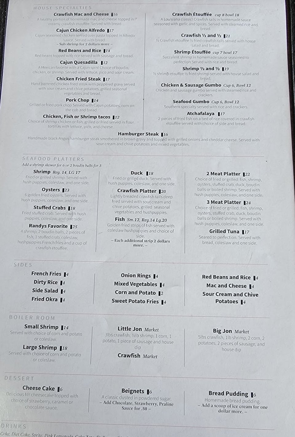 Close-up of a seafood restaurant menu.
